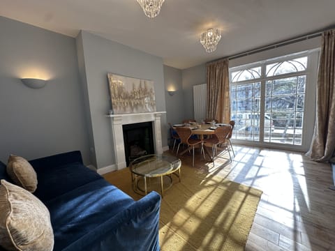 Lounge & Dining with sun drenched french windows