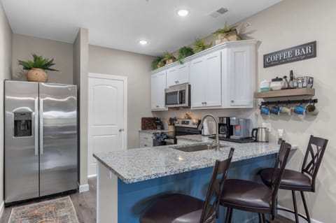 The open kitchen is well equipped for an unforgettable getaway