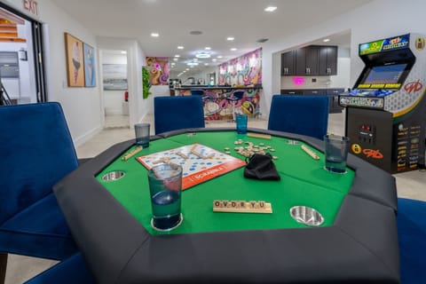 POKER TABLE & GAME ZONE! 4 Arcades games, BIG SCREEN TV, BAR, Pool table, axe throwing, basketball in & outside, bbq, fire table,swing set, board games, pool, bunk beds =best family vacay ever!
#CardTable #PokerNight #GameNights #FamilyFLoridaAirbnb