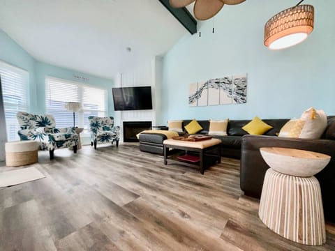 Oversized living room with beach views, comfy oversized sleeper couch along with awesome beach views.