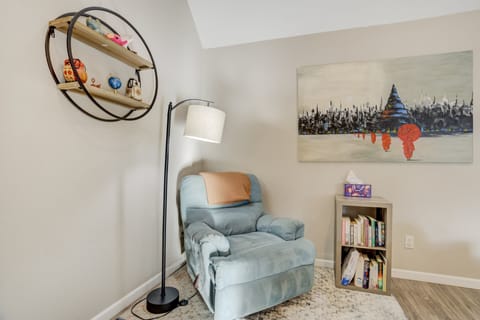 Living room with fireplace, piano, reading nook and smart TV