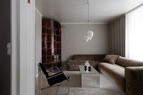 Sink into the cozy corner sofa—the perfect spot for movie nights or relaxed mornings.