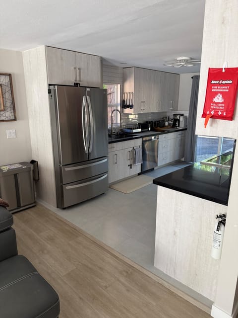 French-door fridge with ice maker, filtered water, and air filtration.