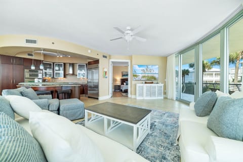 A light-filled living space with captivating views. This inviting room offers a perfect blend of comfort and style, creating a welcoming atmosphere for all.