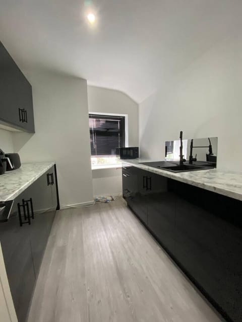 Kitchen area with view to large window