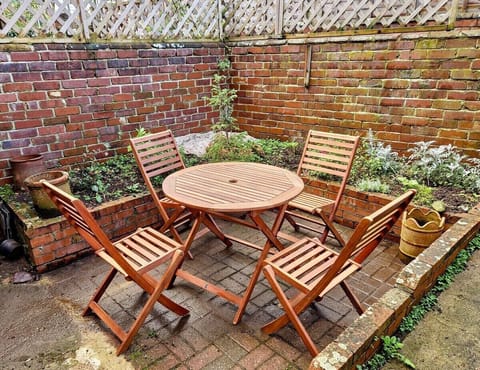 Courtyard garden with garden furniture.