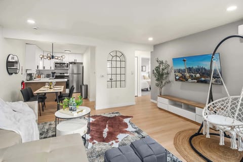 The ultimate living room setup with modern amenities and stylish touches, offering a welcoming atmosphere.