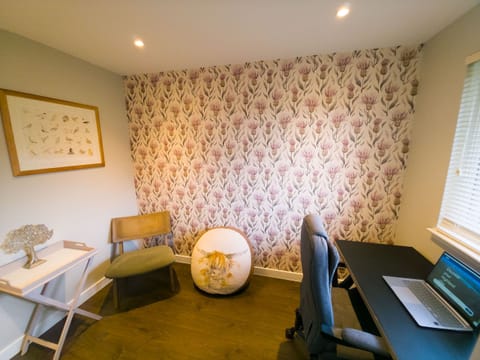 A simple, functional desk and workspace area suitable for remote work.