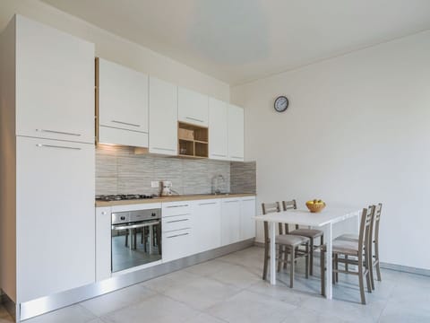 Furniture, Flooring, Interior Design, Wood, Floor, Kitchen, Kitchen Appliance, Major Appliance, Countertop, Ceiling