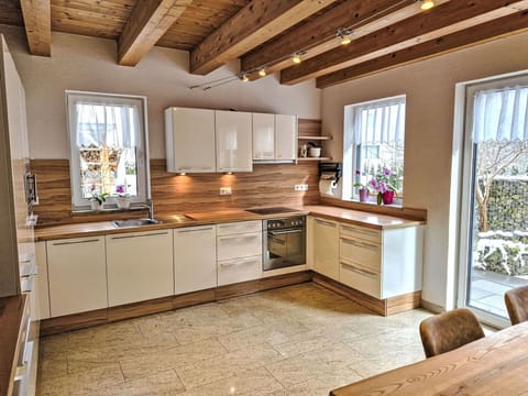 Kitchen, Countertop, Furniture, Flooring, Kitchen Appliance, Interior Design, Cabinetry, Major Appliance, Wood, Floor