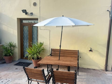 Shaded dining area perfect for relaxing afternoons