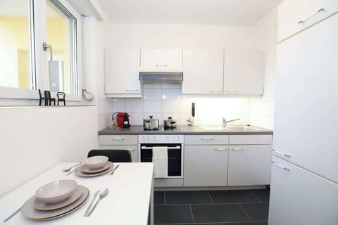 Vibrant yet airy kitchen fully stocked for all your cooking