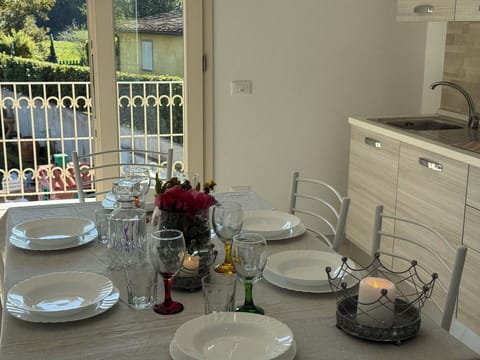 Furniture, Tableware, Interior Design, Table, Flooring, Kitchen & Dining Room Table, Chair, Dining Room, Lighting, Serveware