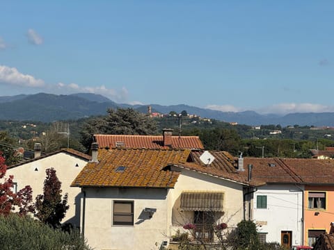 Sky, Mountainous Landforms, Roof, Mountain, Hill, Residential Area, House, Town, Rural Area, Home