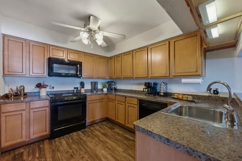 Cook up your favorites in a spacious, fully equipped kitchen—Kitchenaid stand mixer, coffee station, and everything you need for family feasts.