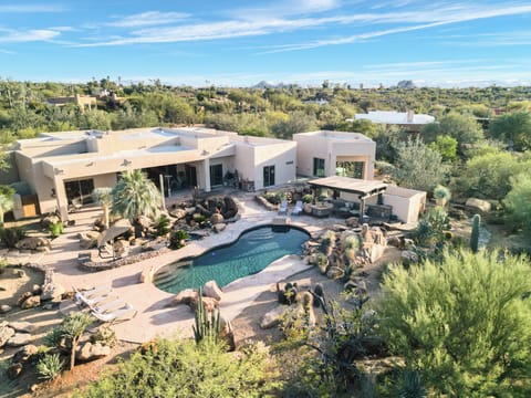 Desert luxury at its finest—expansive estate with a resort-style pool and panoramic views.