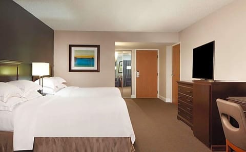 Recharge on crisp double beds in a calm, spacious room.