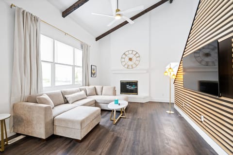 Unwind & stream your favorites on the smart TV in the cozy living room