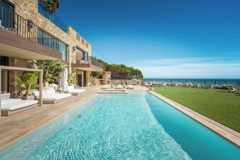 Welcome to Casa di Pietra — your Malibu oceanfront escape.