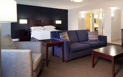 Relax together in the open suite with cozy lounge seating.