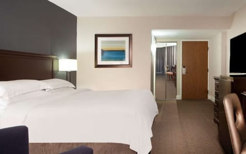 Unwind into crisp linens after a long day of exploring.