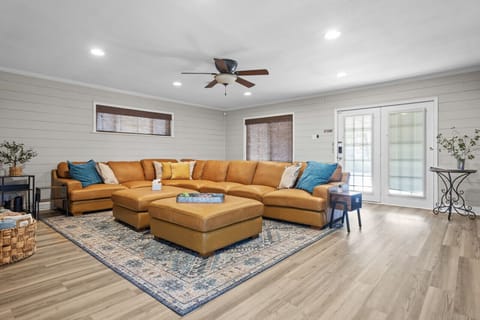 Entertainment room/ Living room 75 In Roku TV / Shuffleboard