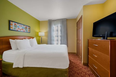 Relax with in-room TV after a long day exploring.