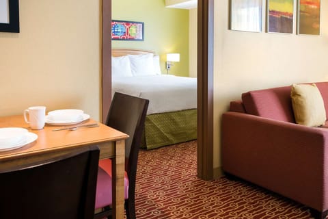Start mornings with coffee at the simple in-suite dining table.