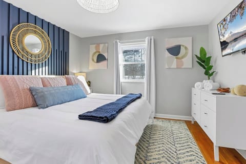 King size pillow-top mattress with 43" 4K smart TV. 