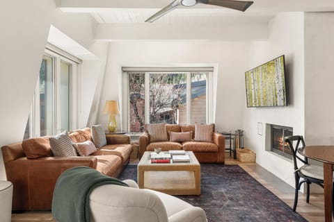 Spacious top-floor 3 bedroom, 2 bath condo with wood-burning fire and Aspen Mountain views in the Chateau Chaumont building.