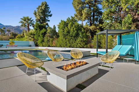 Gather by the fire pit with views, pool, and outdoor fun