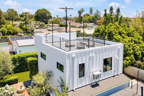 Welcoming exterior with a clean, modern look and a calm, tucked-away feel