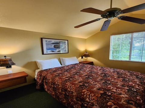 Sink into plush pillows beneath the calming ceiling fan.