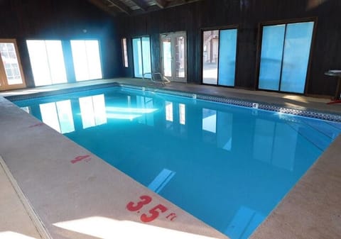 Dive into a warm indoor pool, rain or shine.