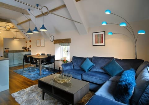 The open plan living area offers plenty of space and comfort, complete with smart TV and Netflix.