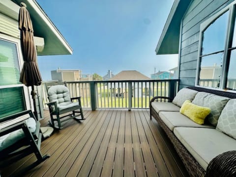 A cozy deck setup perfect for coffee at sunrise and conversations under the stars
