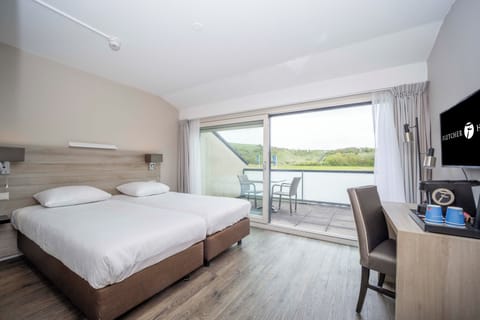 Wake up to airy views and step onto your balcony.