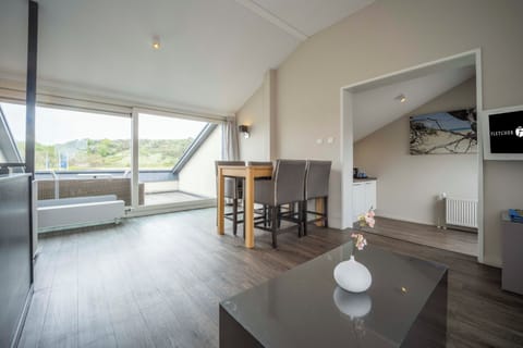 Breathe in the scenery from the sunlit living and dining area.