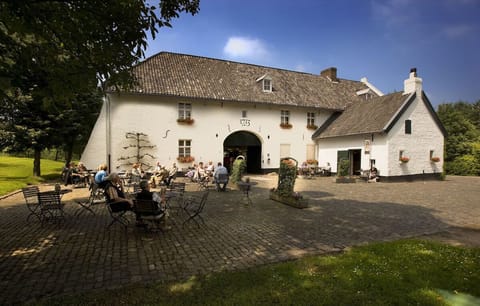 Arrive to a sunlit courtyard and linger over terrace drinks.