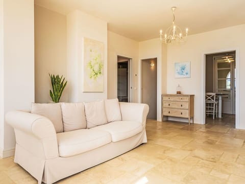 Furniture, Flooring, Floor, Interior Design, Couch, Wood, Room, Table, Living Room, Ceiling