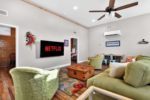 Living Room: Bright and inviting living room with cozy seating, natural light, and a relaxing ambiance perfect for unwinding after a day of exploring.