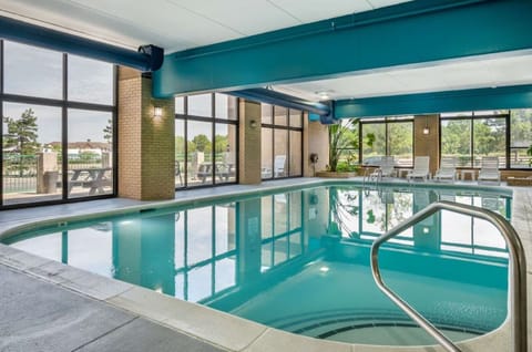 Dive into a sunlit indoor pool for refreshing laps.