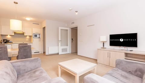 Settle into the airy lounge with kitchenette convenience.