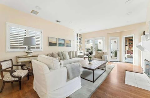 A well-designed living space offering natural light and a comfortable setting for everyday living.