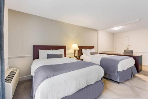 Settle in with extra space between two comfortable queen beds.