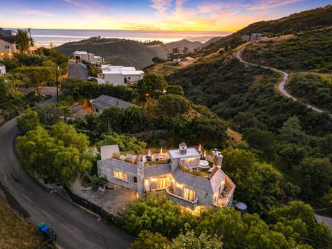 Sunset view of the canyon and ocean horizon.

