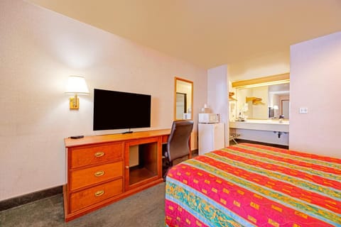 Kick back with your favorite shows and a convenient workspace.