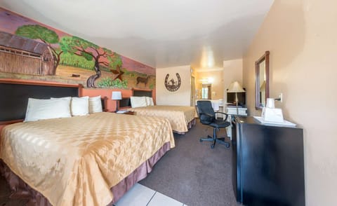 Unwind on two plush beds after a full day exploring.
