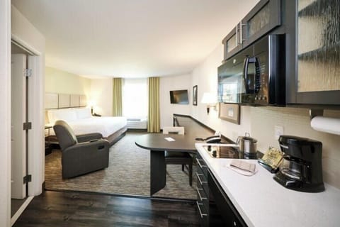 Settle into a spacious studio with kitchenette and bright daylight.