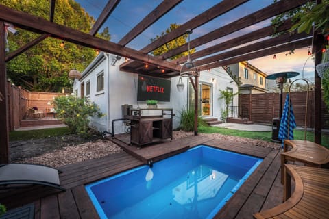 Private backyard pool oasis perfect for relaxing.